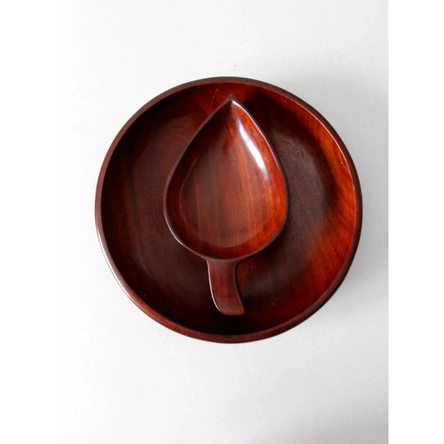 This is a mid-century pair of tropical wooden bowls made in Haiti, crafted from richly toned mahogany wood. The set...