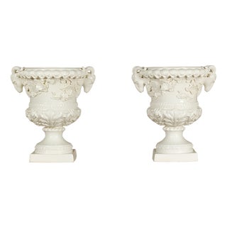 Pair of Blanc de Chine Midcentury Urns with Rams Heads and Ivy Leaves For Sale