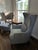 Two Bernhardt lounge chairs featuring beautiful gray leather with a high back and winged sides for extra comfort. The...