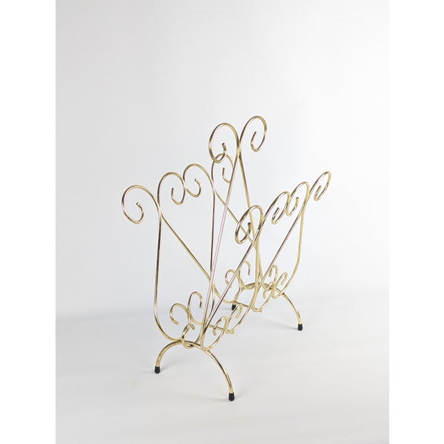 Dimensions: W38 x H51 x D27 cm Weight: 2 kg Gold-colored metal magazine rack, rigid wire frame