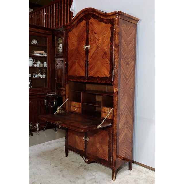 Rare and beautiful louis xv secretary stamped popsel, marked with rosewood and violet wood. this control unit, is a unique...