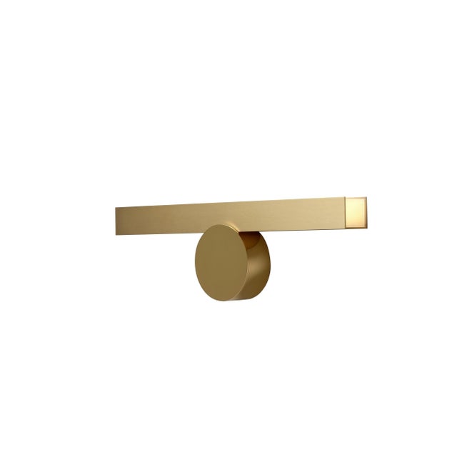 Ip calee v1 satin and polished brass wall light by pool dimensions: d45 x w4.4 x h13 cm materials: solid brass, satin and...