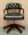 Stunning hand made in England Bottle Green Leather Chesterfield Court Captains armchair with Thomas Chippendale style...