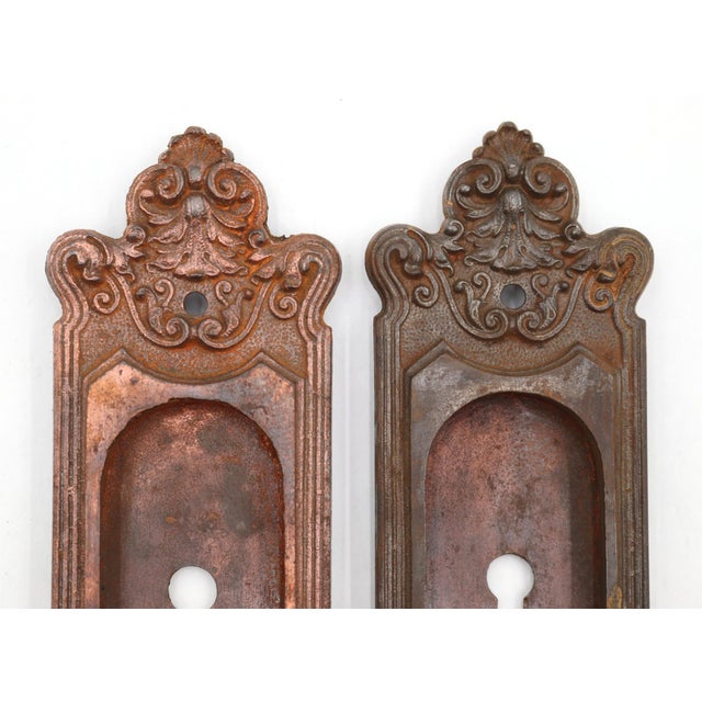 Antique Victorian style recessed pocket pulls made of cast iron with a copper finish. Made by Sargent. The original...