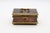 Circa 1800-1820 copper & brass jewelry casket box, English. Raised on ball feet. Once fabric lined. 4.5" w., 3.5" d., 2.5" h.