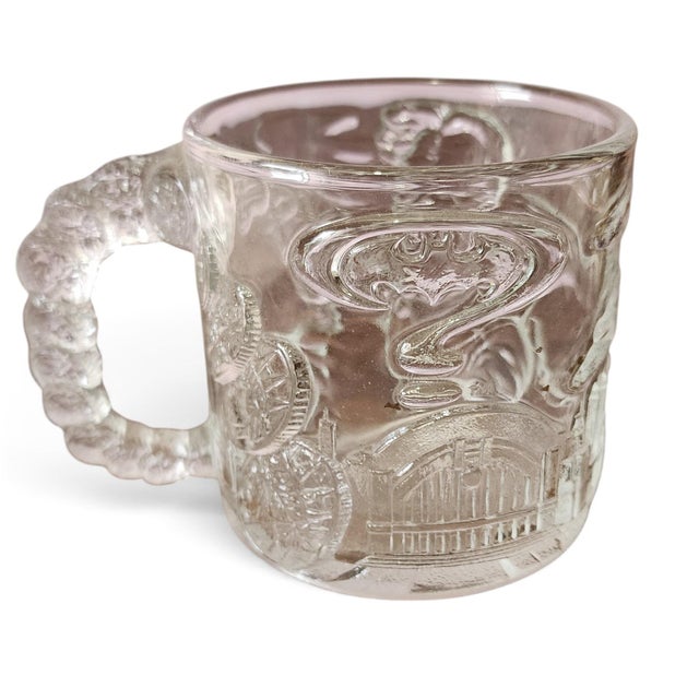 Vintage 1995 McDonalds Batman Forever Two-Face Raised Glass Handled Mug. Raised Two-Face flipping coins that turn into...
