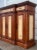 Impressive tall rustic European style sideboard credenza by Hooker Furniture. Wide center drawer over a double door...