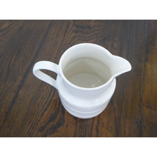 This English ironstone pitcher is marked on the underside.