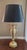 This striking statement piece features a heavy, solid brass urn-style trophy body mounted on a robust tiered base. With...