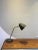 The switch is on the lampshade. This piece has an attribution mark, I am sure that it is completely authentic and take...