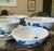 A beautiful set of 4 blue on white studio pottery bowls with platter decorated with leaf motifs from the 1980s. The bowls...