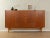 Wonderful highboard from the 1960s in Scandinavian design. High-quality body in teak veneer with four cabinet doors, six...