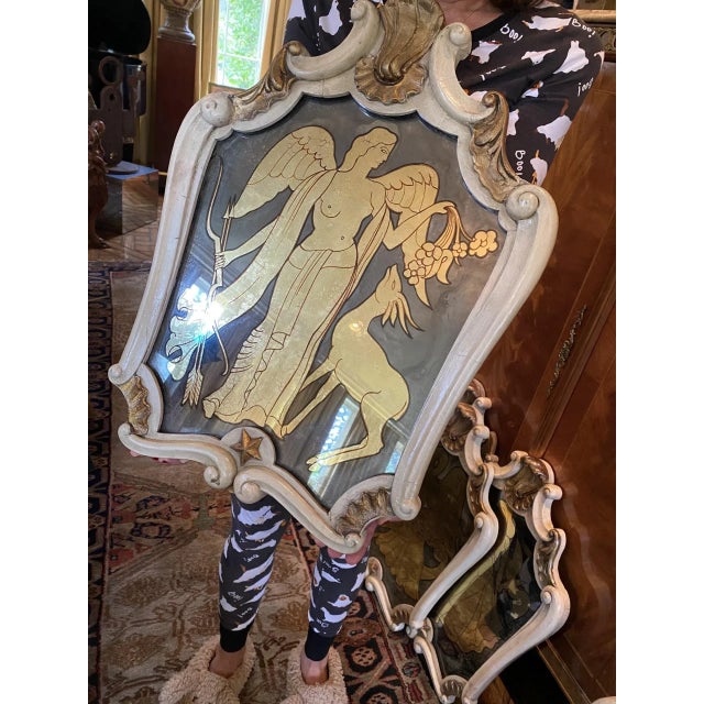 This is one in a spectacular suite of six rare Maison Jansen exquisitely stylized wall mirrors of the most versatile...
