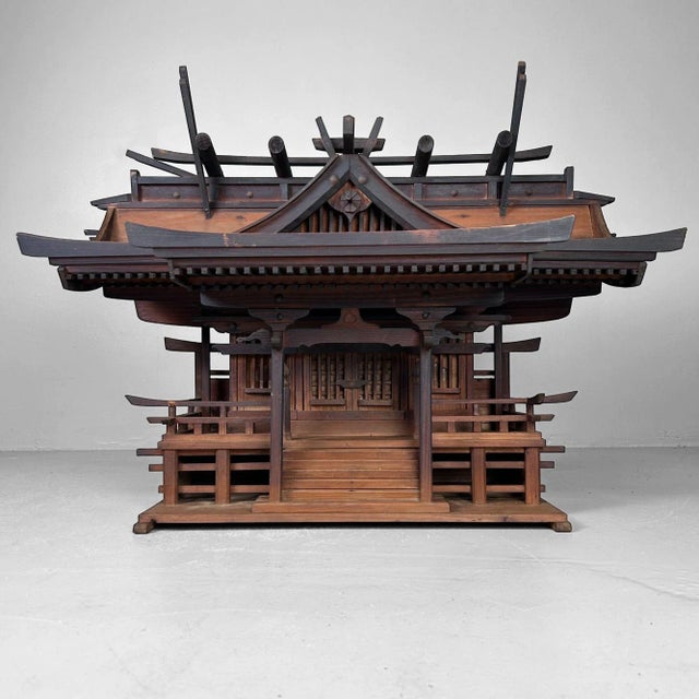 This authentic wooden kamidana (神棚), dating from around 1868–1912, is a rare and striking example of traditional Japanese...