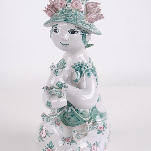 Bjørn wiinblad figurine no. 93 crafted in ceramic with green and pink decoration and a floral motif. The figurine is...