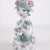 Bjørn wiinblad figurine no. 93 crafted in ceramic with green and pink decoration and a floral motif. The figurine is...