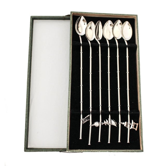 Being offered is a complete set of twelve ice tea / mint julep spoons. Each set of six come in the original case. The case...