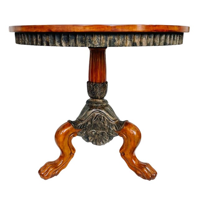 A French Regency style gueridon center table with a tripod claw base by Charles Pollock for William Switzer. Made by hand...