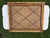Vintage decorative tack board crafted from split bamboo with an intricately braided rattan border and woven natural-fiber...