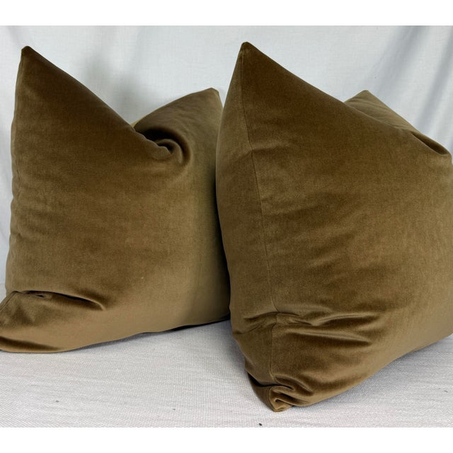 Custom pair of 22" pillows covered in a bronze colored cotton velvet. These pillows have tapered corners to prevent dog...