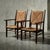 These rationalist armchairs marry severe modernist geometry with earthy Spanish craftsmanship. Richly patinated solid...