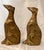 Vintage heavy brass greyhound bookends sitting with a curled tail and upturned snout. Great piece of dog decor.