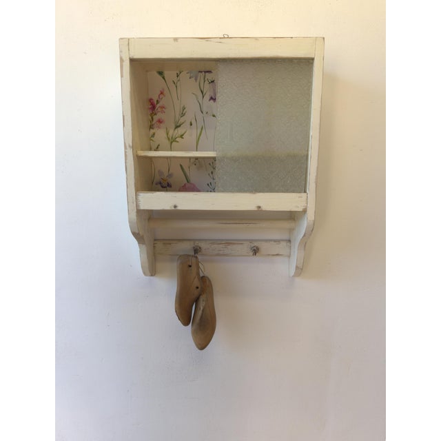 Old wooden kitchen shelf from the 60s. Interesting and made of solid wood. The shelf has been cleaned and protected with...