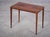 Elegant side table designed by Johannes Andersen and produced by Silkeborg Møbelfabrik in Denmark during the 1960s....