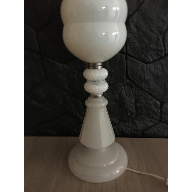 Large beautiful white glass table lamp. The photos do not reflect the charm of this lamp. in the lower part of the thick...