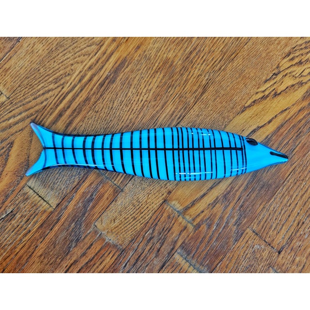 In this listing you will find a very rare Murano art glass figurine of a blue fish with the black stripes. It was designed...