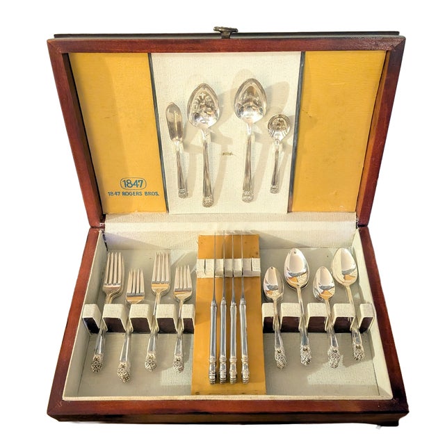 Elevate your holiday table landscapes or daily dining rituals with this exquisite 52-piece silver-plated flatware service...