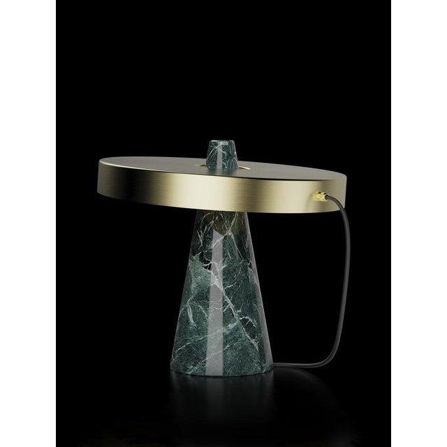 Table lamp with Guatemala green stone base and brushed brass lightshade. The light shade is disconnected from the stone...