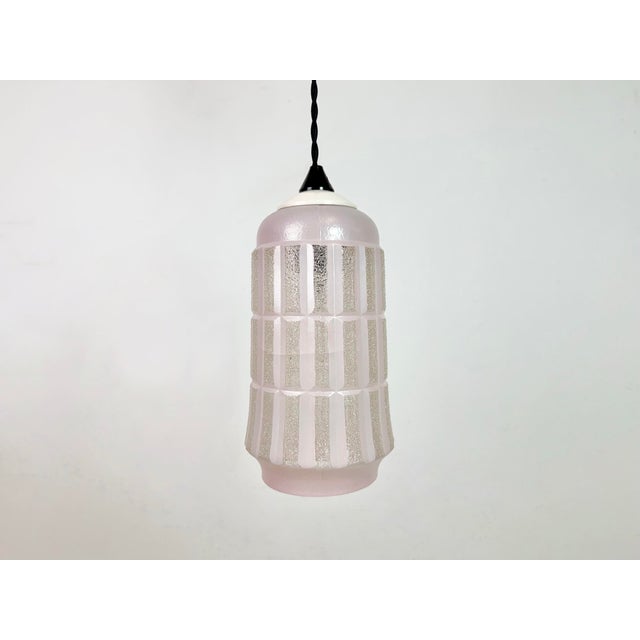 Vintage pink glass ceiling light made in former Czechoslovakia during the 1970s. The socket requires standard E27/E26...