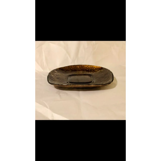 This vintage umber / gold decorative plate from Turkey is a beautiful and heavy catchall dish for display atop your coffee...