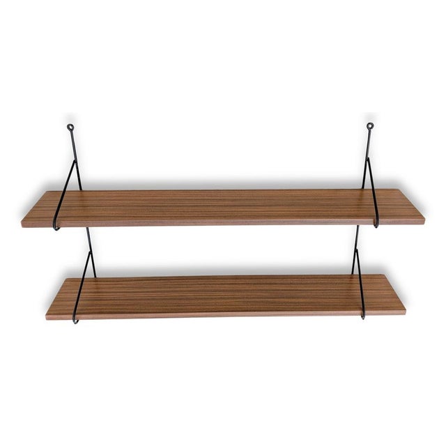 We are offering a beautiful vintage wall shelf with two shelves for sale. The shelf dates back to the 1960s and is...