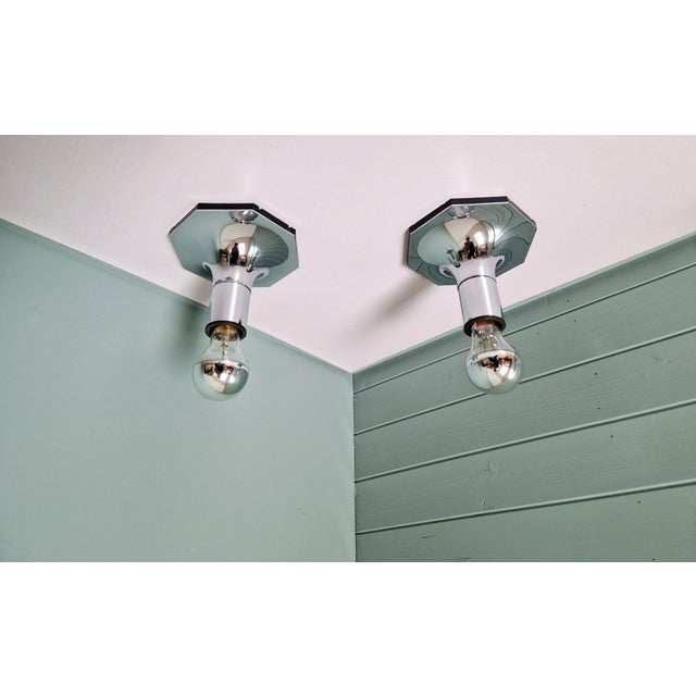 Pair of chrome-plated metal wall sconces/spotlights, space age model no. 6606/09, designed by japanese designer motoko...