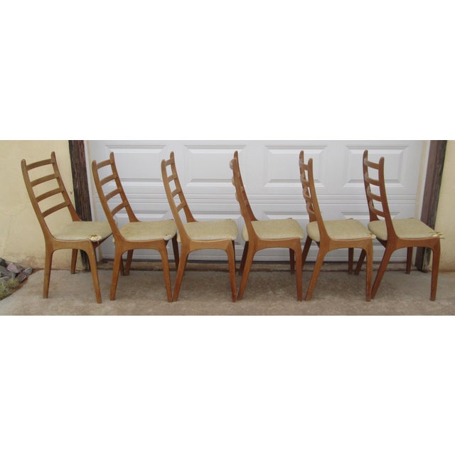 Vintage set of 6 Danish Modern Ladderback dining chairs by Korup Stolefabrik, Denmark. The wood appears to be teak. The...