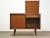 A mid century modern walnut cabinet credenza or bar with lift up tops and sliding doors. Refinished exterior. 40.25” wide....