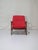 Beautiful red armchair designed by Rolf Rastad and Adolf Relling for Dokka Möbler, Norway, 1950s. This comfortable chair...