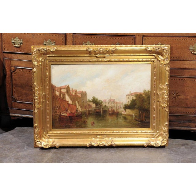 This oil on canvas painting from the late 19th century depicts a serene scene. In the center of the composition sits a...