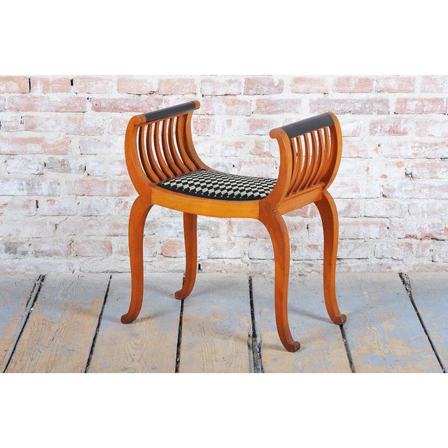 This exceptionally elegant, shape-refined, and historically valuable stool in the spirit of French Art Deco dates from the...