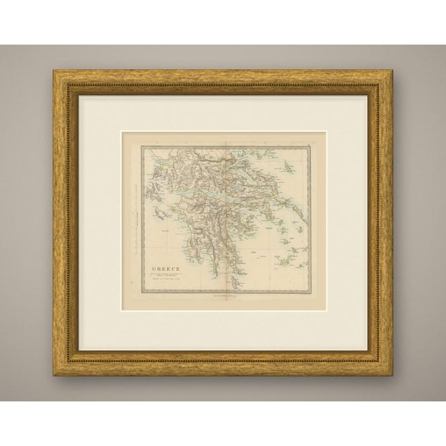 An original antique map of greece, a steel engraving colored by hand in outline, with a pale blue wash along the coasts....