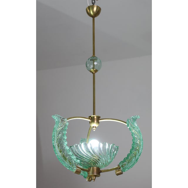 Stunning Murano chandelier extremely rare for its unique green acquamarine color. The chandelier is certainly attributed...