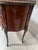 Small louis xv style half-moon commode with cube back three drawers in the front four cabriole legs with bronze sabots...