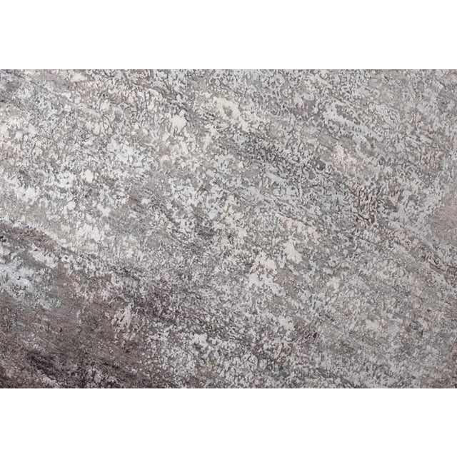 Hand knotted of top quality wool and silk. This unique and innovative modern design Rug is an eye catching example that...