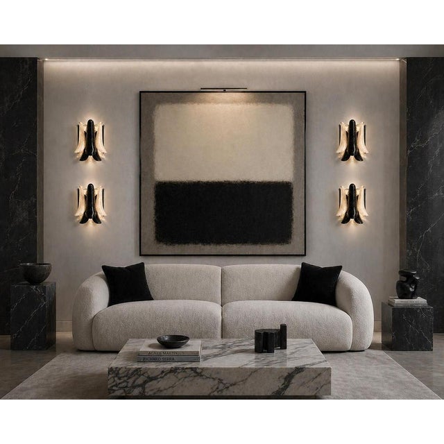 Set of Four Murano Wall Sconces with Black and White “Sella” Glass Elements and Gold Inclusions This exceptional set of...