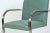 An elegant pair of vintage Mid-Century Modern flat-bar chrome cantilever armchairs in the style of Ludwig Mies van der...