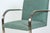 Pair of Ludwig Mies van der Rohe flat bar chairs for Knoll. Polished flat stainless steel frames upholstered in a Harris...