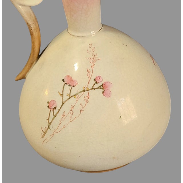 This exquisite vase is a work of art, created in the Art Nouveau style. It features beautiful floral patterns in a...