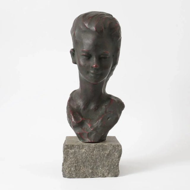 Patinated ceramic bust on a stone base. This piece has an attribution mark, I am sure that it is completely authentic and...